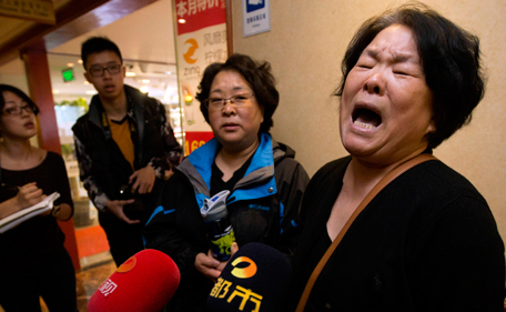 (AP Photo/Ng Han Guan)